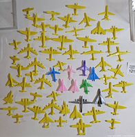 Entire collection of plastic airplanes spread on wall