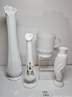 front view of all four milk glass items