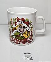 Front view showing Miss Piggy and Kermit design on mug