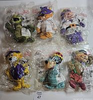 All six sealed Dairy Queen Hanna-Barbera plush toys displayed
