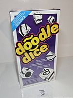 Front of sealed Doodle Dice box