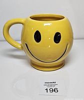Front view showing smiley face graphic and overall appearance