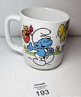 Left side view showing Smurf with satchel and flowers graphic