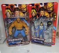 Front view of both sealed Fantastic Four figures in packaging