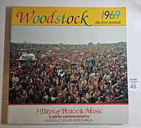 Front cover showing title, festival panorama, and subtitle