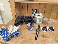 Overview of all nine items on wooden surface