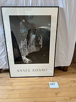 Full view of framed Ansel Adams poster with frame and mat visible