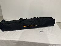 Closed carry bag showing logo