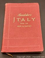 Front cover showing red cloth and gilt title