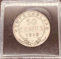 Reverse of 1918 Newfoundland 50 cents coin in holder