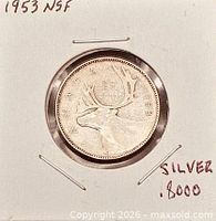 Reverse showing caribou and date 1953