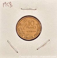 Coin in 2x2 holder marked 1958