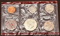 Front of sealed 1969 coin set showing five coins and token
