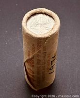 End view of roll showing Queen Elizabeth II obverse coin