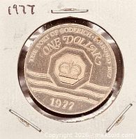 Full view of coin reverse showing crown, waves, date 1977