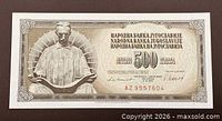 Obverse of the 500 Dinara banknote with seated figure and serial number