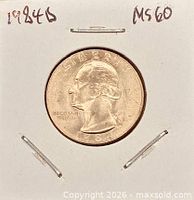 Coin obverse in holder showing date and mint mark
