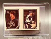 Front view showing both player images and card numbers