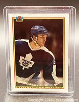 Front of 1990-91 Bowman Al Iafrate card in protective holder