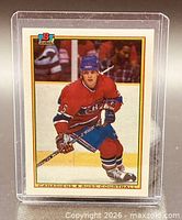 Front of Russ Courtnall Bowman card in holder