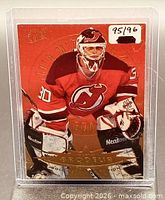 Front of Martin Brodeur Gold Medallion card in protective sleeve