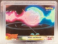 Front of Ash's Sacrifice card in sleeve