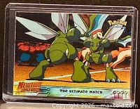 Front of Topps Pokémon card #34 "The Ultimate Match" in sleeve