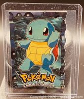 Front view of Squirtle foil card