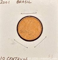Obverse side of 2001 10 Centavos coin in flip