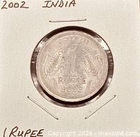 Obverse view showing Lion Capital and legends