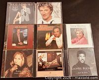 Front covers of all eight CDs