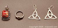 Front view of pendant, ring, earrings