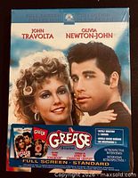 Front cover of sealed Grease Blu-ray case