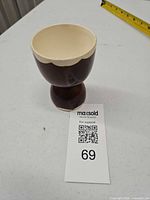 Full egg cup showing interior and height reference