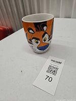 Front view showing Tony the Tiger face on mug