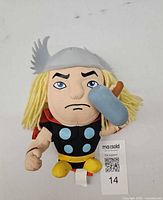 Front view of Thor plush with helmet, hammer, MaxSold tag 14 visible
