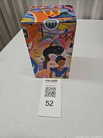 Front view of sealed Barbie glass box with graphics