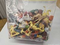 Bagged assortment of small plastic animal figurines