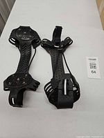 Full view of both rubber ice cleats showing overall design and condition