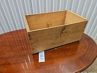 front and interior view of wooden crate