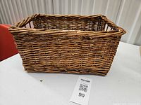 Top angled view of wicker rattan basket on table