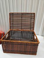 Basket open showing interior construction and hinged lid