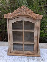 Full view of pine wall cabinet front