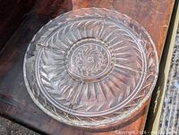 Top view of entire clear glass divided platter showing pattern and compartments