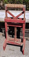 Full view of front of wooden outfeed roller stand