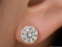 Stud earring worn in ear showing size and appearance