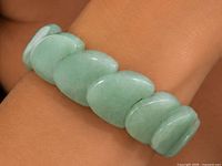 Bracelet worn on wrist displaying color and bead shape