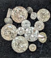 Close-up of all loose diamonds on black background