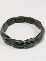 Bracelet laid flat showing rectangular seraphinite beads