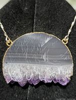 Close-up of pendant front left
